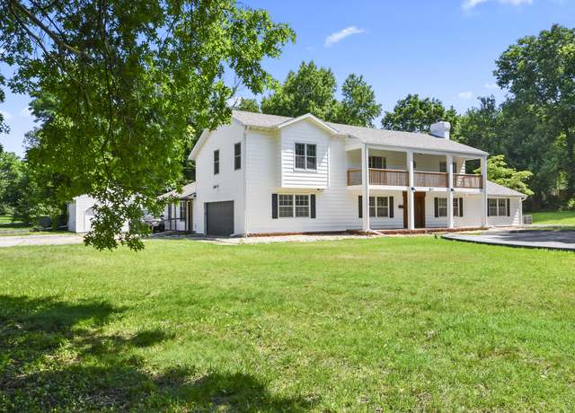 Property at 3011 E Lamonta Dr, Springfield, MO 65804, 5 beds, 4 baths