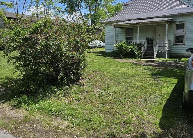 Property at 110 N Elm St, Conway, MO 65632, 4 beds, 2 baths