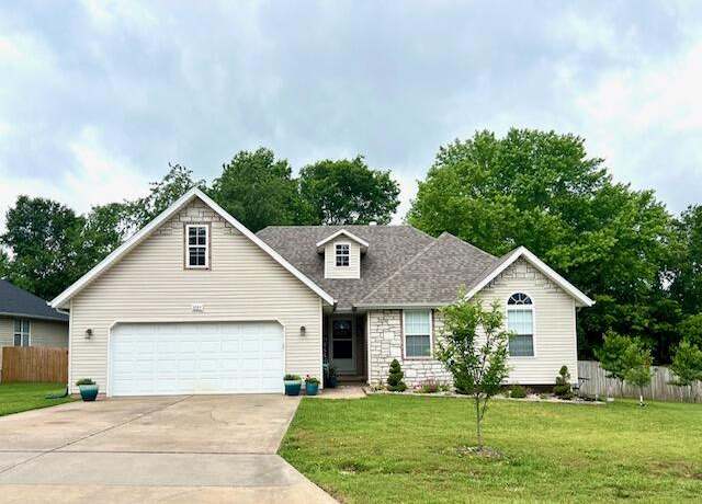Property at 1727 S Burks Ave, Springfield, MO 65807, 4 beds, 2 baths