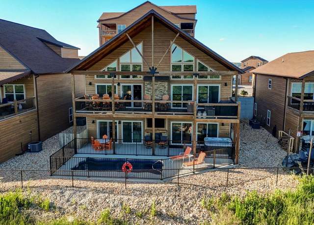 Property at 128 Settlers Cv, Kimberling, MO 65686, 7 beds, 6.5 baths