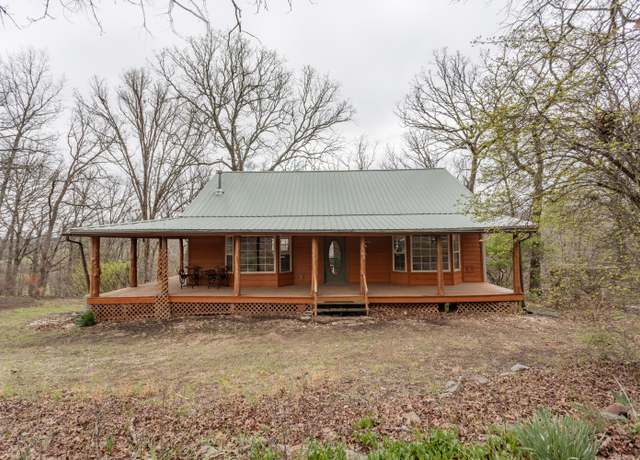 Property at 1982 Mannon Rd, Bradleyville, MO 65614, 4 beds, 3 baths