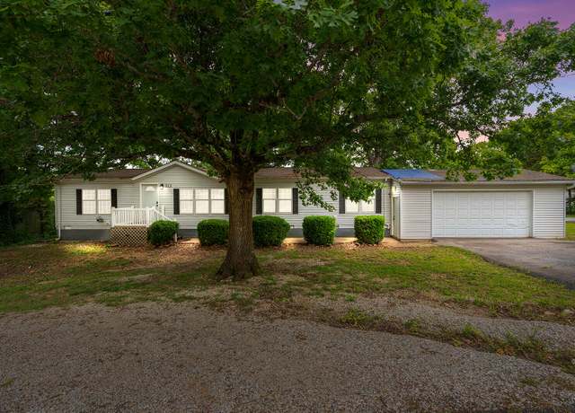 Property at 313 Laurel St, Hollister, MO 65672, 4 beds, 2 baths