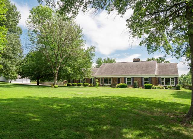 Property at 5724 E Mill St St, Springfield, MO 65802, 4 beds, 3 baths