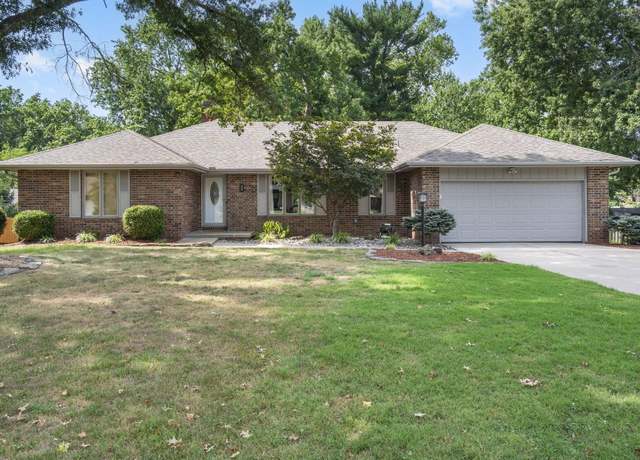 Property at 1880 E Cardinal St, Springfield, MO 65804, 5 beds, 3.5 baths