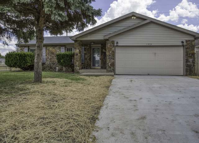 Property at 1304 W Downing St, Springfield, MO 65807, 3 beds, 2 baths
