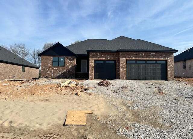 Property at 2121 N Silver Charm Ave, Springfield, MO 65802, 4 beds, 2 baths
