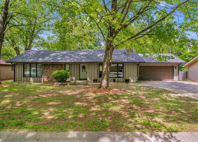 Property at 1129 E Oak Tree Ln, Springfield, MO 65810, 4 beds, 2 baths