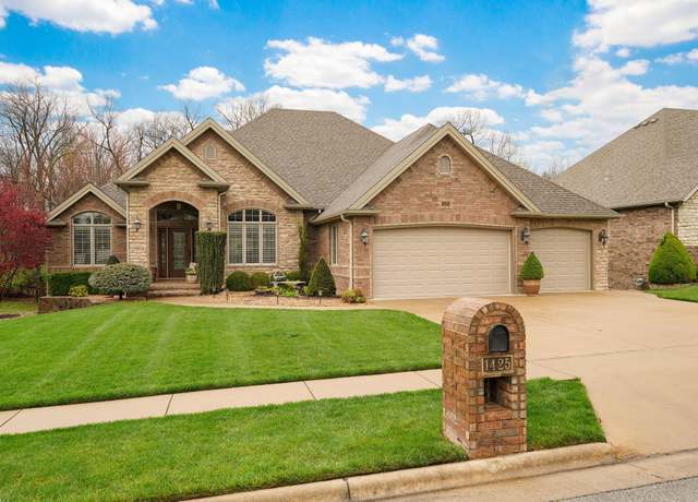 Property at 1425 E Wood Oaks St, Springfield, MO 65804, 5 beds, 3.5 baths