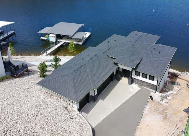 Property at 439 Redbud Ln, Lake Ozark, MO 65049, 5 beds, 5 baths