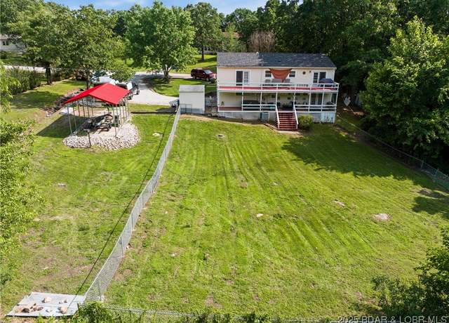 Property at 205 Lazy River Ln, Camdenton, MO 65020, 4 beds, 3 baths