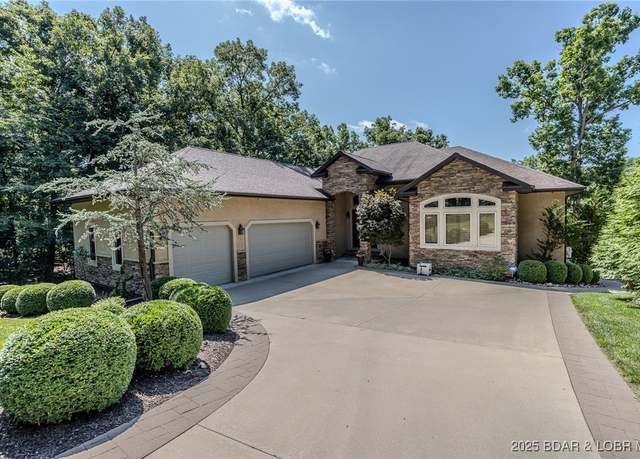Property at 720 Via Del Lago Dr, Sunrise Beach, MO 65079, 5 beds, 5.5 baths