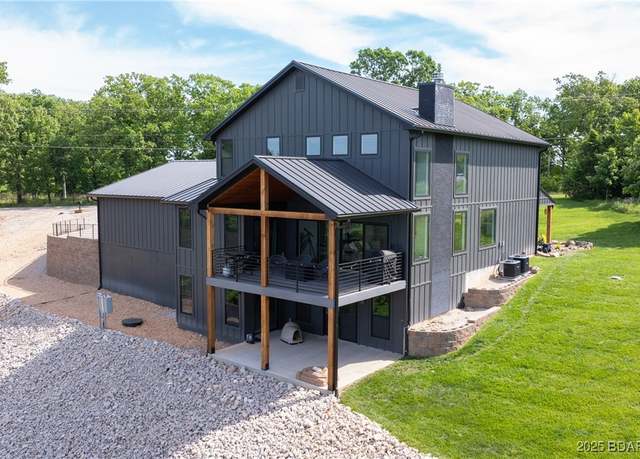 Property at 1275 Bluff Dr, Osage Beach, MO 65065, 5 beds, 4 baths