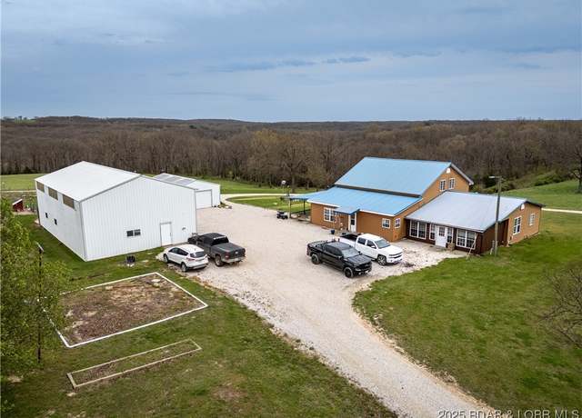 Property at 14671 Old Marvin Rd, Versailles, MO 65084, 5 beds, 3 baths