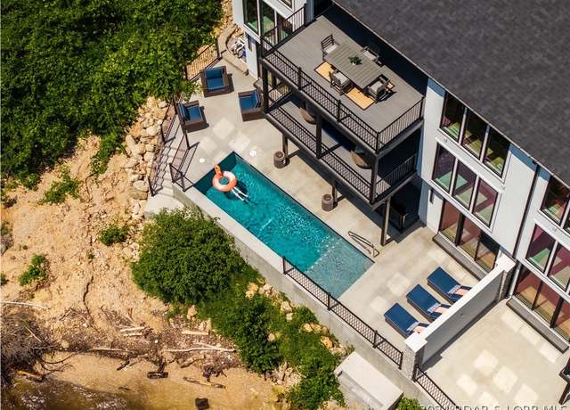 Property at 128 Palisades Yacht Club Dr, Lake Ozark, MO 65049, 4 beds, 5 baths
