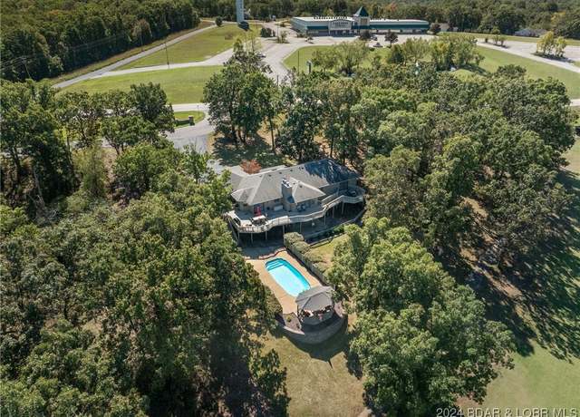 Property at 102 Apache Dr, Laurie, MO 65037, 4 beds, 4 baths