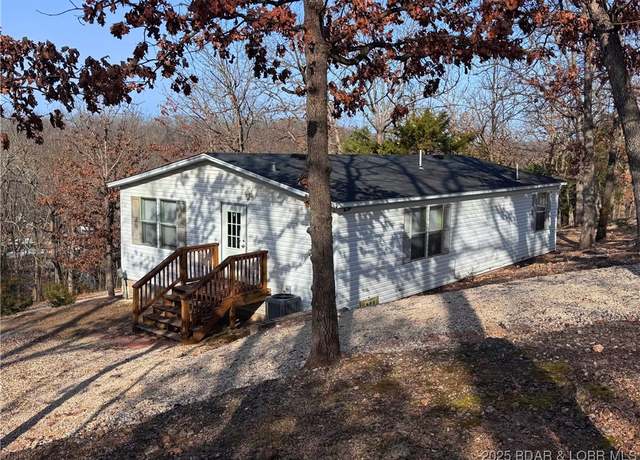 Property at 1401 Chimney Pt, Sunrise Beach, MO 65079, 3 beds, 2 baths