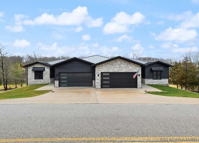 Property at 590 Hogan Dr, Lake Ozark, MO 65049, 4 beds, 3.5 baths