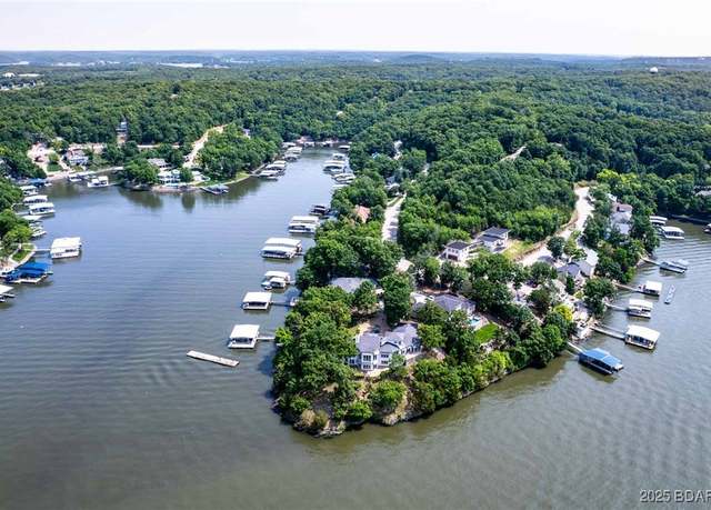 Property at 570 Palisades Dr, Four Seasons, MO 65049, 5 beds, 5.5 baths