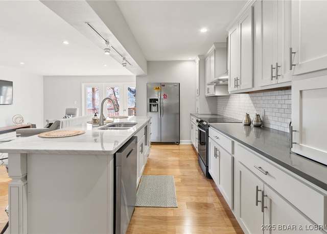 Property at 7 Lone Timber Unit 1B, Four Seasons, MO 65049, 3 beds, 2 baths