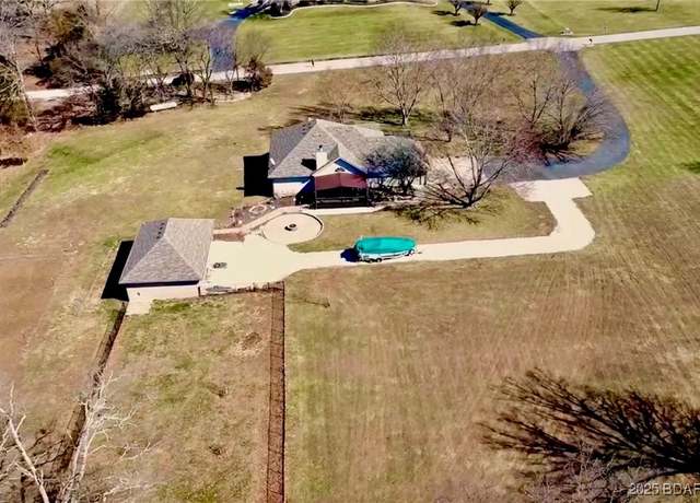 Property at 197 Lakota Dr, Linn Creek, MO 65052, 5 beds, 3 baths