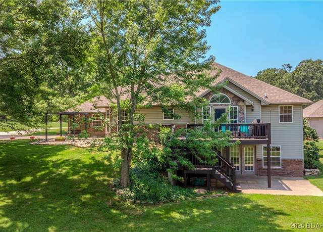 Property at 197 Lakota Dr, Linn Creek, MO 65052, 5 beds, 3 baths