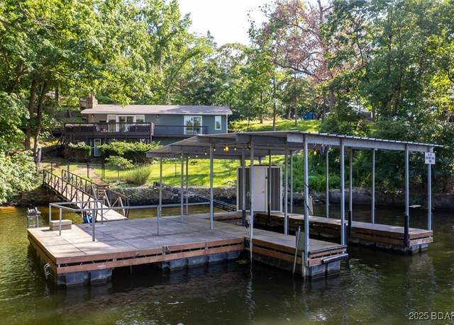 Property at 6059 Sioux Trl, Osage Beach, MO 65065, 5 beds, 3.5 baths