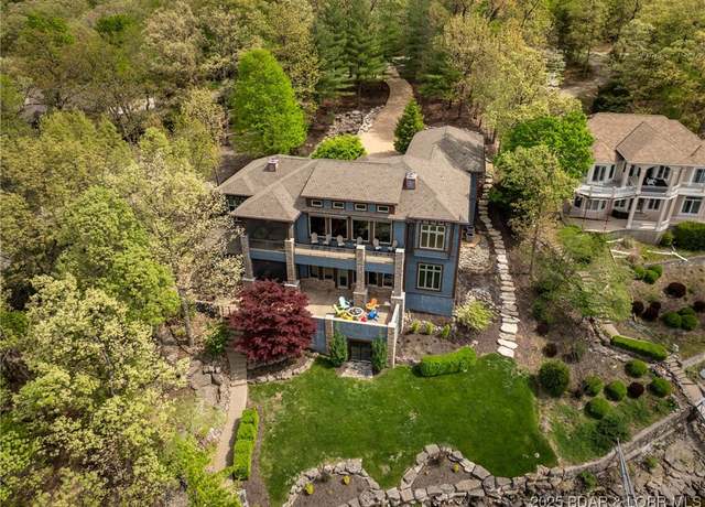 Property at 32 Wild Pines Ct, Villages, MO 65079, 5 beds, 6 baths