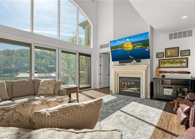 Property at 394 Woodland Heights Dr, Sunrise Beach, MO 65079, 6 beds, 7.5 baths