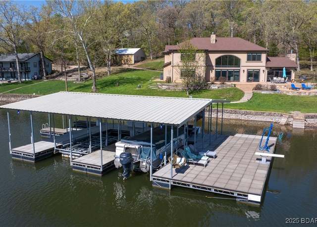 Property at 394 Woodland Heights Dr, Sunrise Beach, MO 65079, 6 beds, 7.5 baths