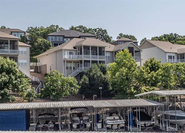 Property at 548 Lakeshore Dr, Lake Ozark, MO 65049, 5 beds, 4 baths