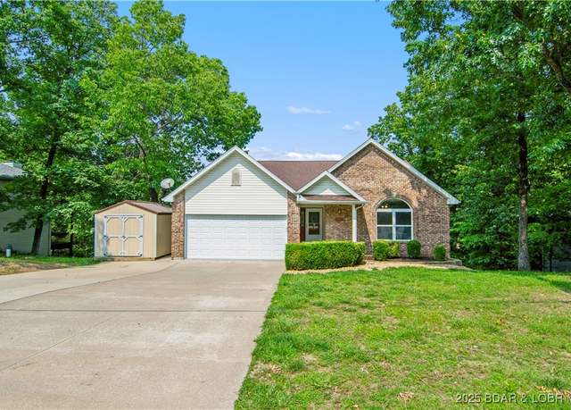 Property at 1380 Bluff Dr, Osage Beach, MO 65065, 4 beds, 3.5 baths