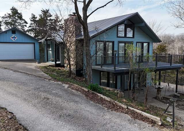 Property at 28960 Gibson Pt W, Gravois Mills, MO 65037, 4 beds, 2 baths