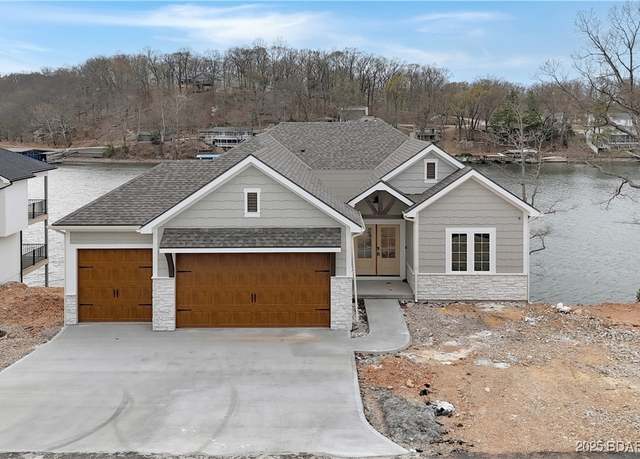 Property at 129 Hollow Oak Ct, Sunrise Beach, MO 65079, 4 beds, 4 baths