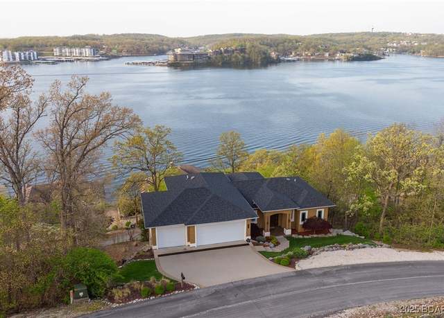 Property at 1027 Beacon Ridge Dr, Lake Ozark, MO 65049, 4 beds, 3 baths