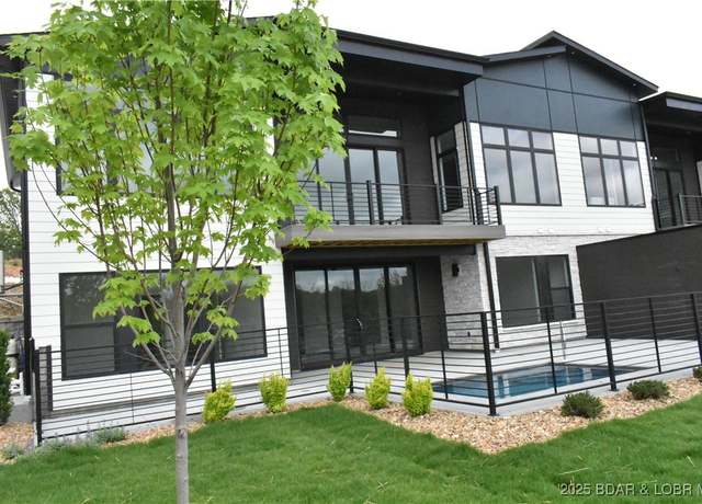 Property at 1152 Normandy Rd, Osage Beach, MO 65065, 5 beds, 3.5 baths