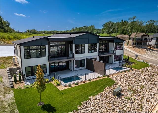 Property at 1152 Normandy Rd, Osage Beach, MO 65065, 5 beds, 3.5 baths