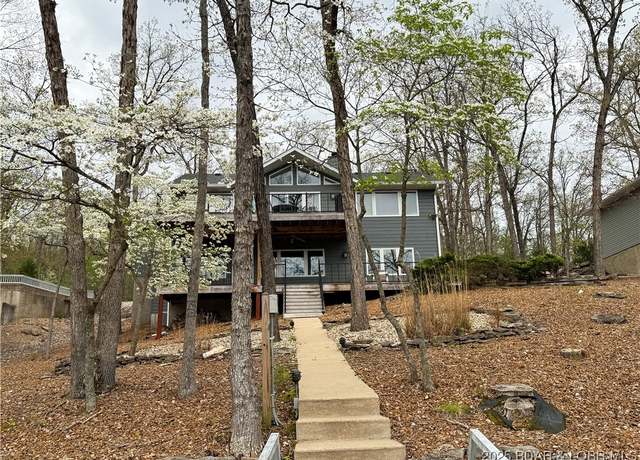 Property at 1247 Country Club Dr, Four Seasons, MO 65049, 4 beds, 3.5 baths