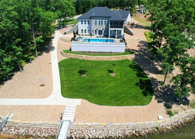 Property at 243 E Villages Estates Rd, Sunrise Beach, MO 65079, 5 beds, 5.5 baths