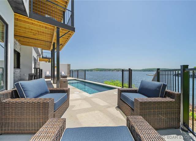 Property at 94 Palisades Yacht Club Dr, Lake Ozark, MO 65049, 4 beds, 5 baths