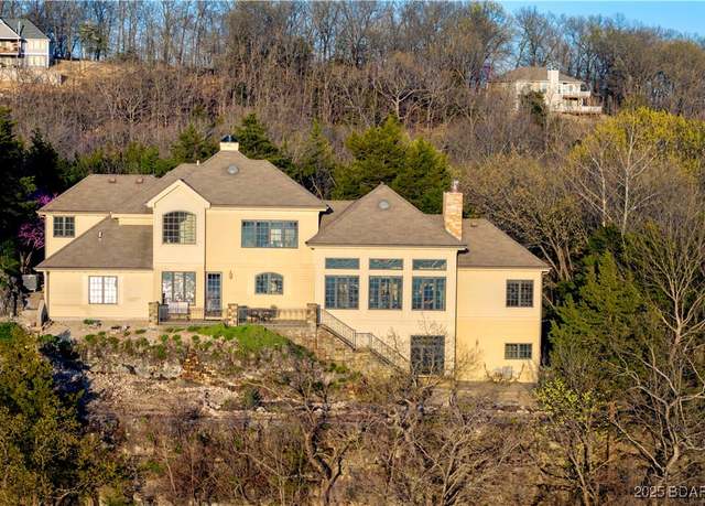 Property at 1310 Swiss Village Rd, Osage Beach, MO 65065, 4 beds, 4.5 baths