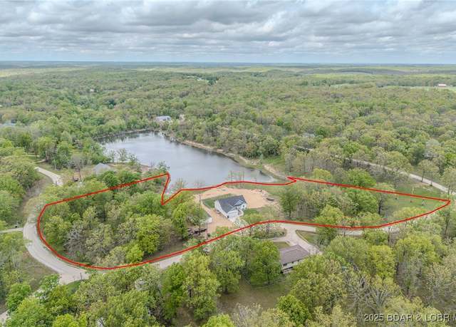 Property at 735 Lake of The Woods Dr, Macks Creek, MO 65786, 5 beds, 3 baths