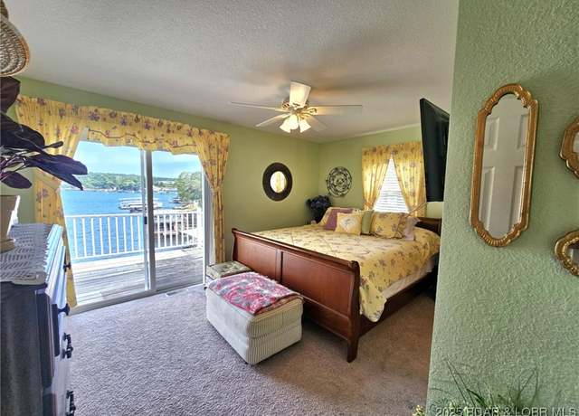 Property at 19524 Blossom Pointe Ln, Rocky Mount, MO 65072, 4 beds, 4 baths