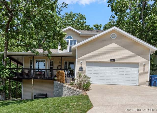 Property at 6449 Eagle Crossing Dr, Osage Beach, MO 65065, 5 beds, 3.5 baths