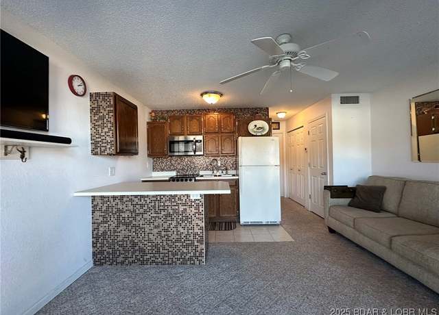 Property at 5655 Heron Bay Unit B102, Osage Beach, MO 65065, 1 bed, 1 bath