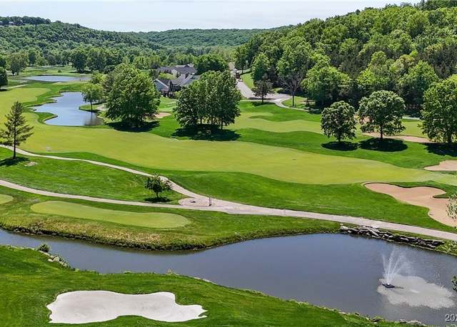 Property at 403 Payne Stewart Ct, Lake Ozark, MO 65049, 4 beds, 4 baths
