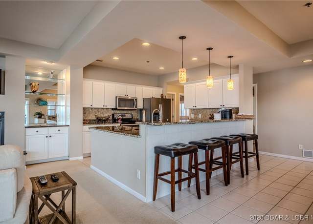Property at 212 E Palisades Condo Dr Unit 1A, Lake Ozark, MO 65049, 4 beds, 4 baths