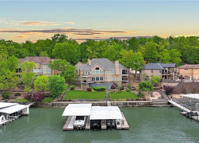 Property at 705 Regency Cove Dr, Four Seasons, MO 65049, 5 beds, 6 baths