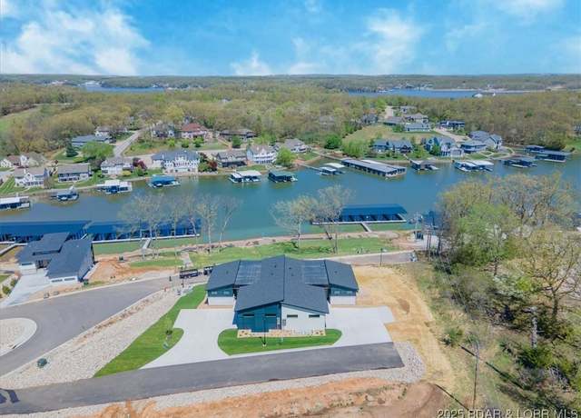 Property at 1150 Normandy Rd, Osage Beach, MO 65065, 5 beds, 3.5 baths