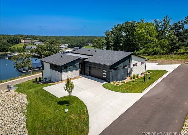 Property at 1150 Normandy Rd, Osage Beach, MO 65065, 5 beds, 3.5 baths