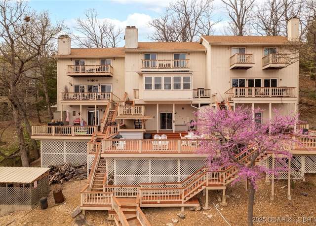 Property at 70 Ravenwood Dr, Lake Ozark, MO 65049, 3 beds, 4 baths